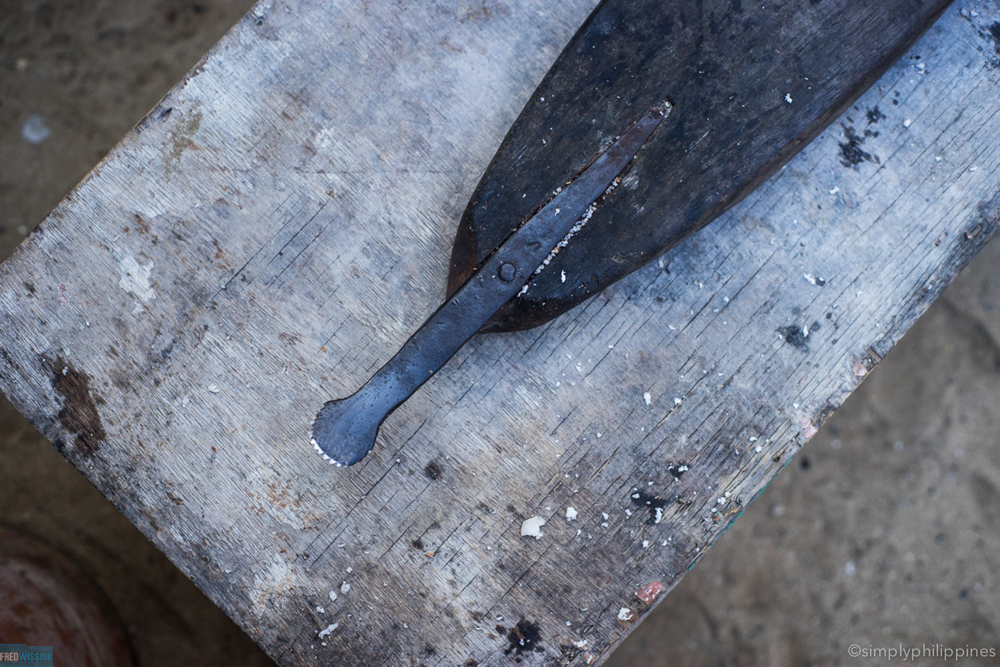 Coconut is grated by hand in small kitchens in the Philippines