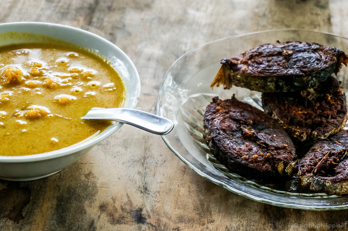 A local meal: Pumpkin in coconut milk and fried tuna.